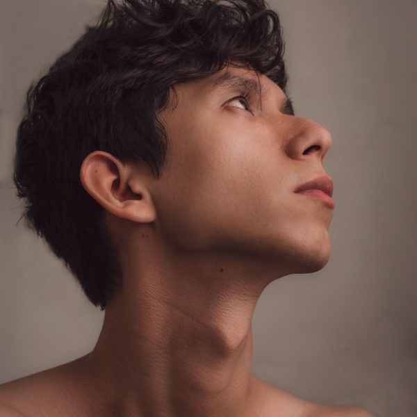 topless man with black hair