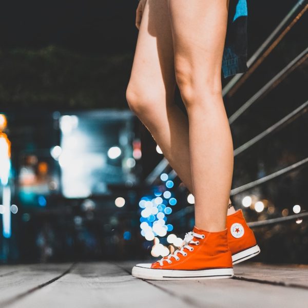 pair of red Converse high-tops